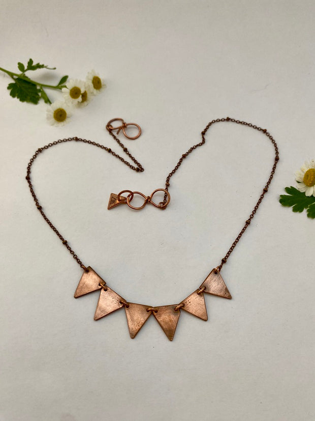 recycled copper plumbing pipe upcycle jewelry five triangle bunting necklace handmade in usa simple wealth art