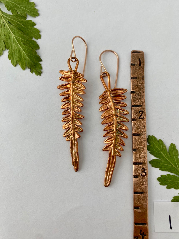 real fern leaf earrings electroplated with recycled copper ans 14 karat gold by simple wealth art made in usa