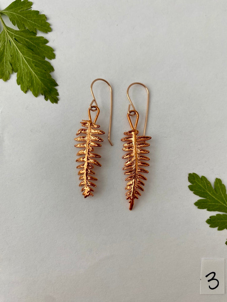 real fern leaf earrings electroplated with recycled copper ans 14 karat gold by simple wealth art made in usa