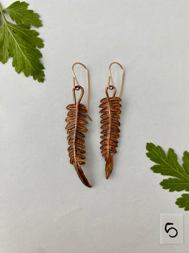 real fern leaf earrings electroplated with recycled copper ans 14 karat gold by simple wealth art made in usa