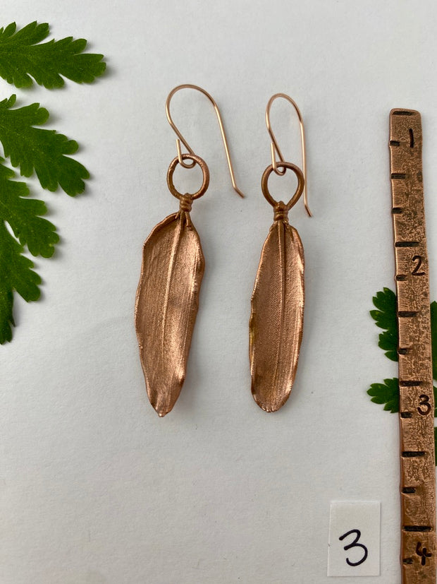 real feather earrings recycled copper electroplated feather earrings handmade 14 karat rose gold ear wires made in usa simple wealth art