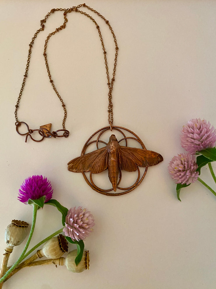 recycled copper electroplated bug rodent necklace wall hanging skull and plant creepy jewelry crystal made in usa simple wealth art