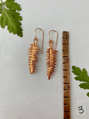real fern leaf earrings electroplated with recycled copper ans 14 karat gold by simple wealth art made in usa